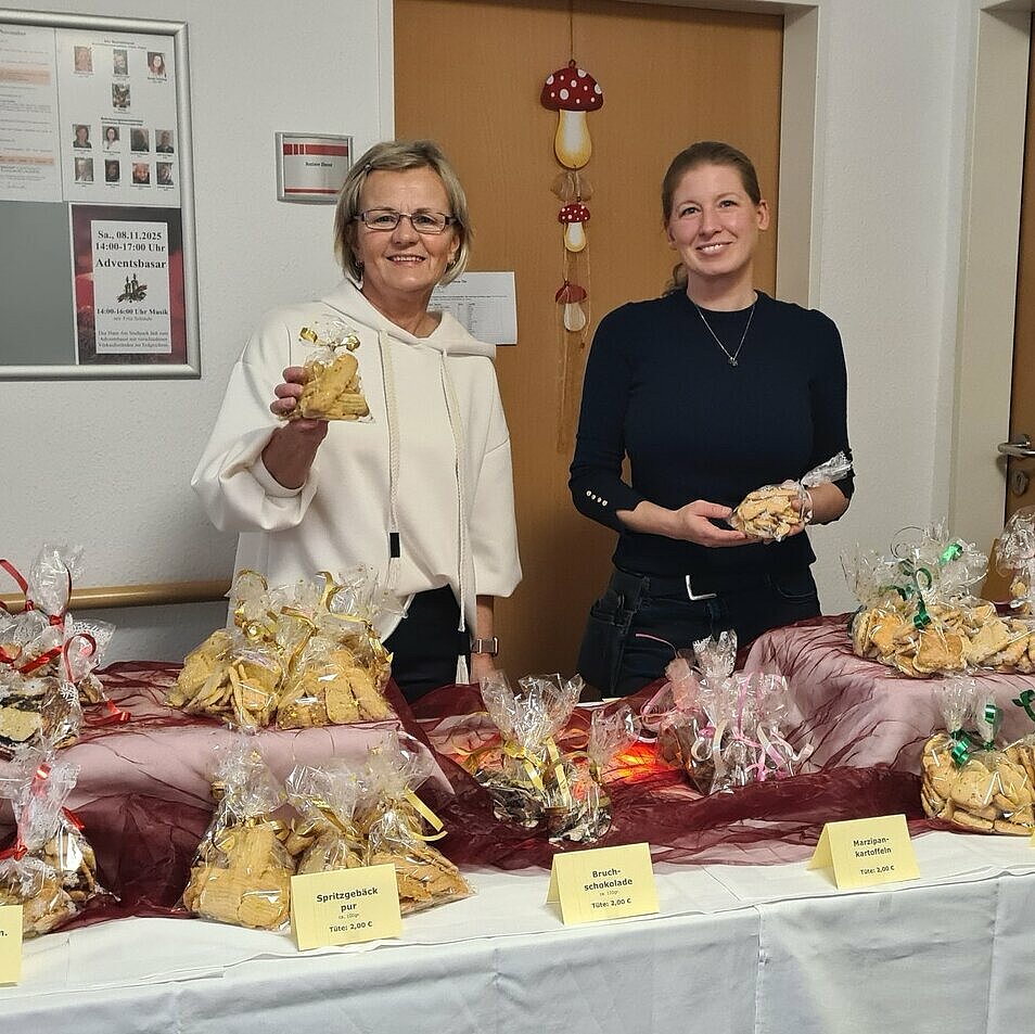 Mitarbeiter vom Stand des Hauses